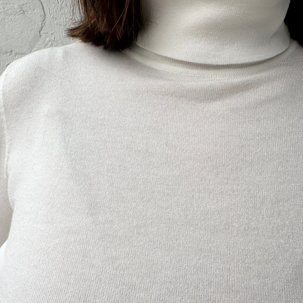 
                      
                        Basic White Turtle Neck
                      
                    