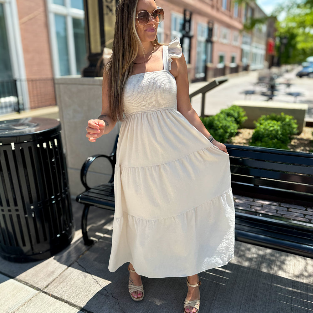 
                      
                        Timeless Taupe Midi Dress
                      
                    