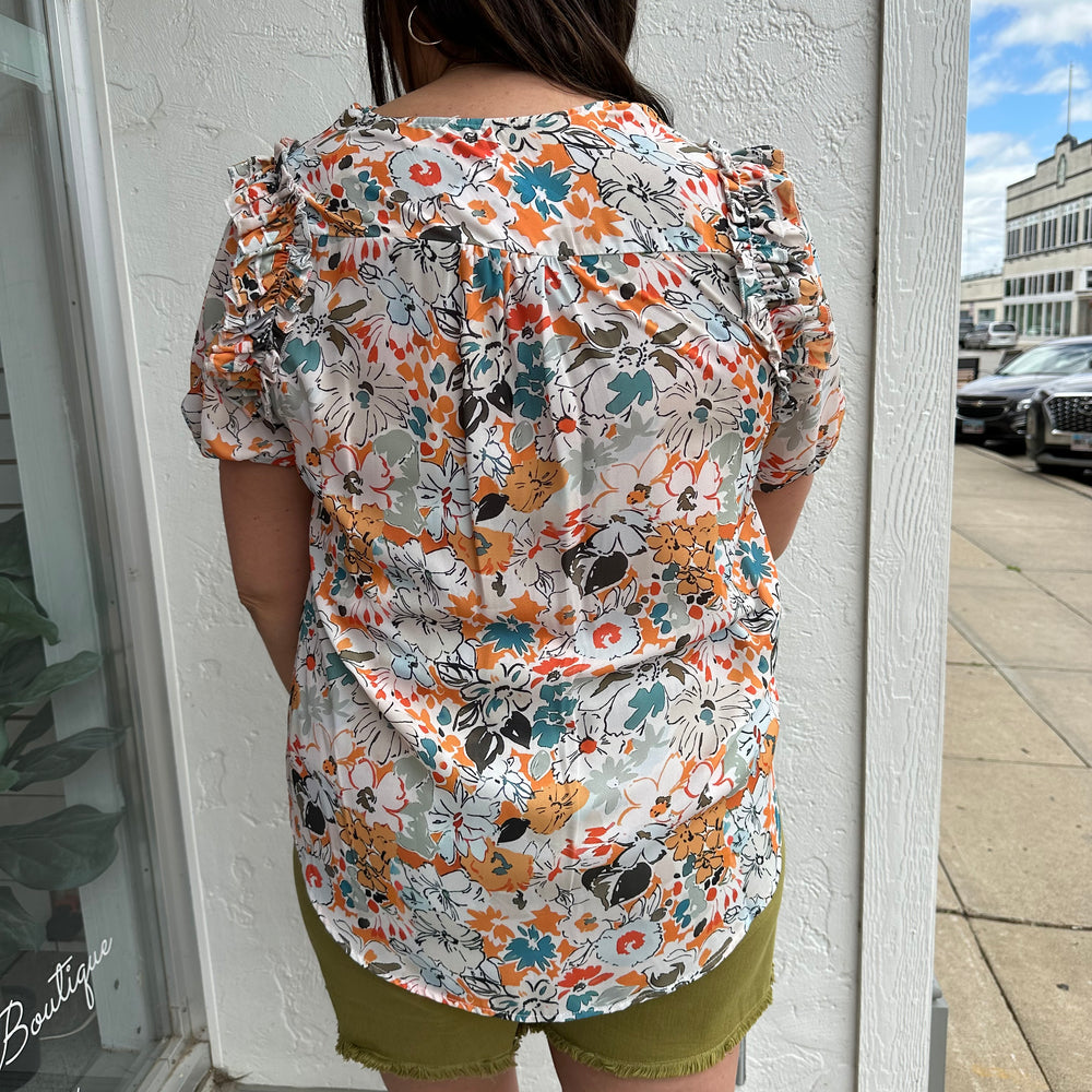 
                      
                        Floral Party Blouse
                      
                    