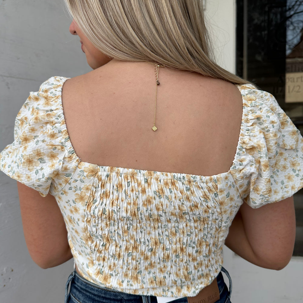 
                      
                        Delicate Floral Top
                      
                    