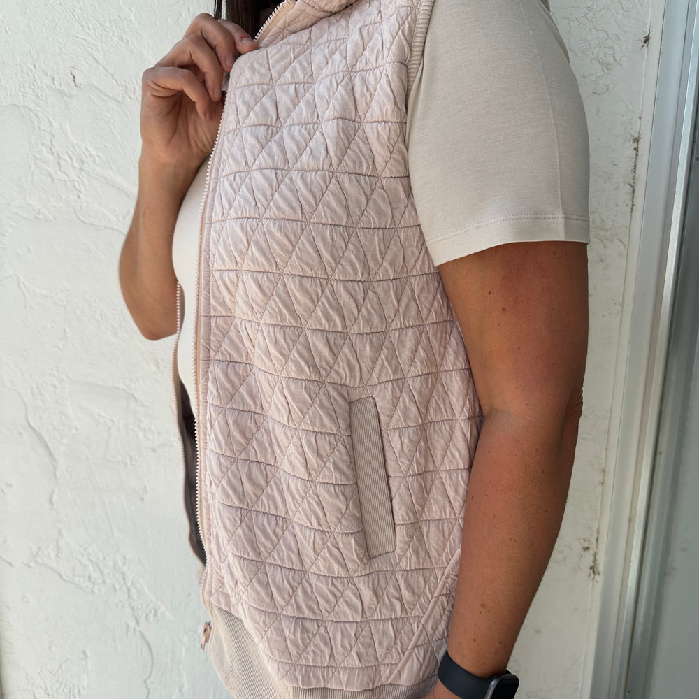 
                      
                        Blush Quilted Vest
                      
                    