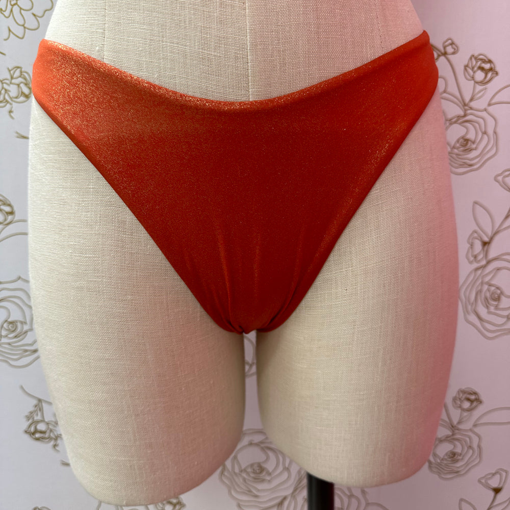 
                      
                        Orange Shimmer Bikini Bottom
                      
                    