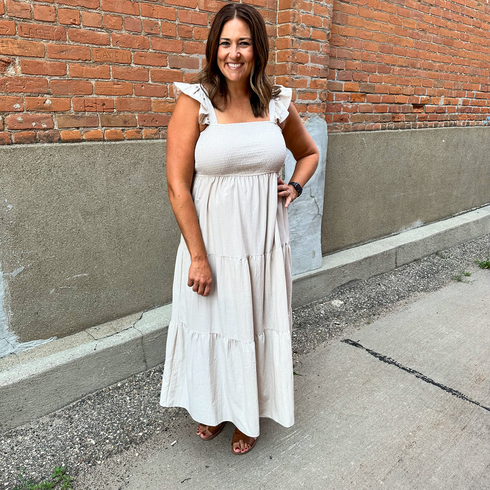 
                      
                        Timeless Taupe Midi Dress
                      
                    