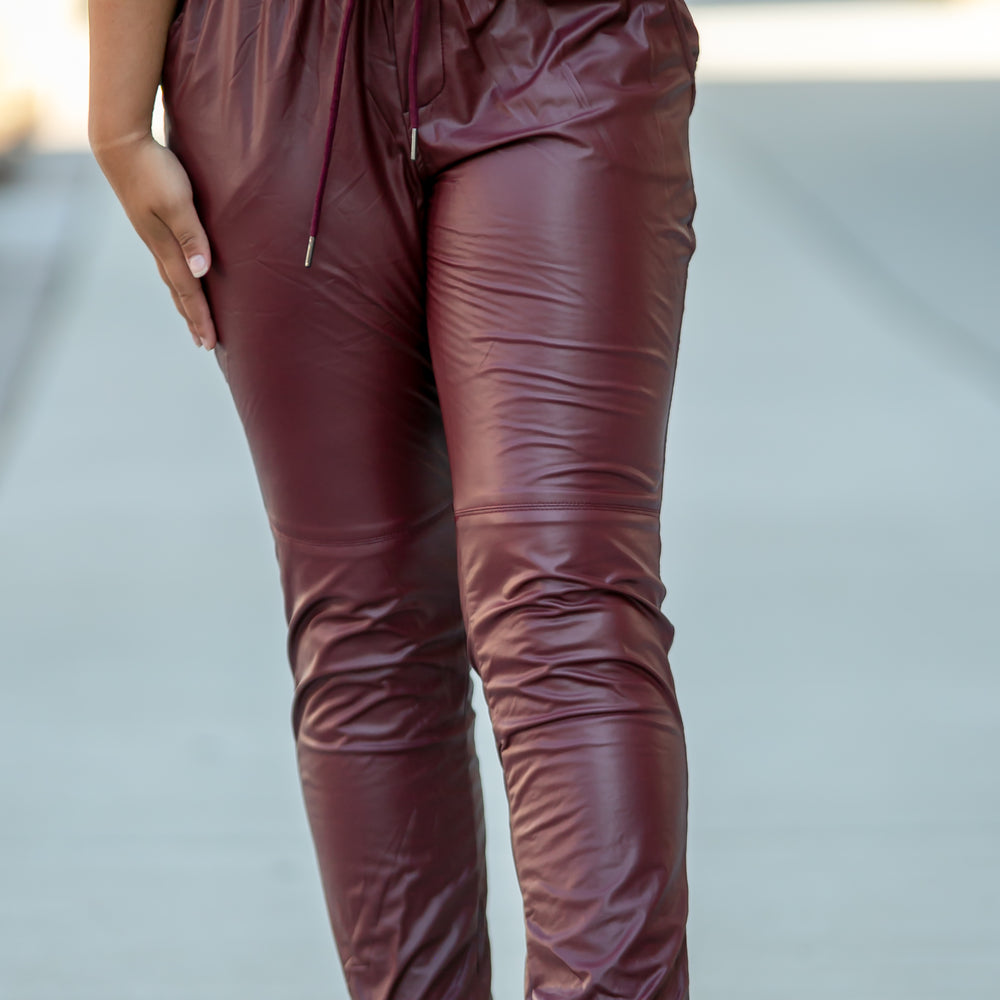 
                      
                        Wine Down Faux Leather Pants
                      
                    